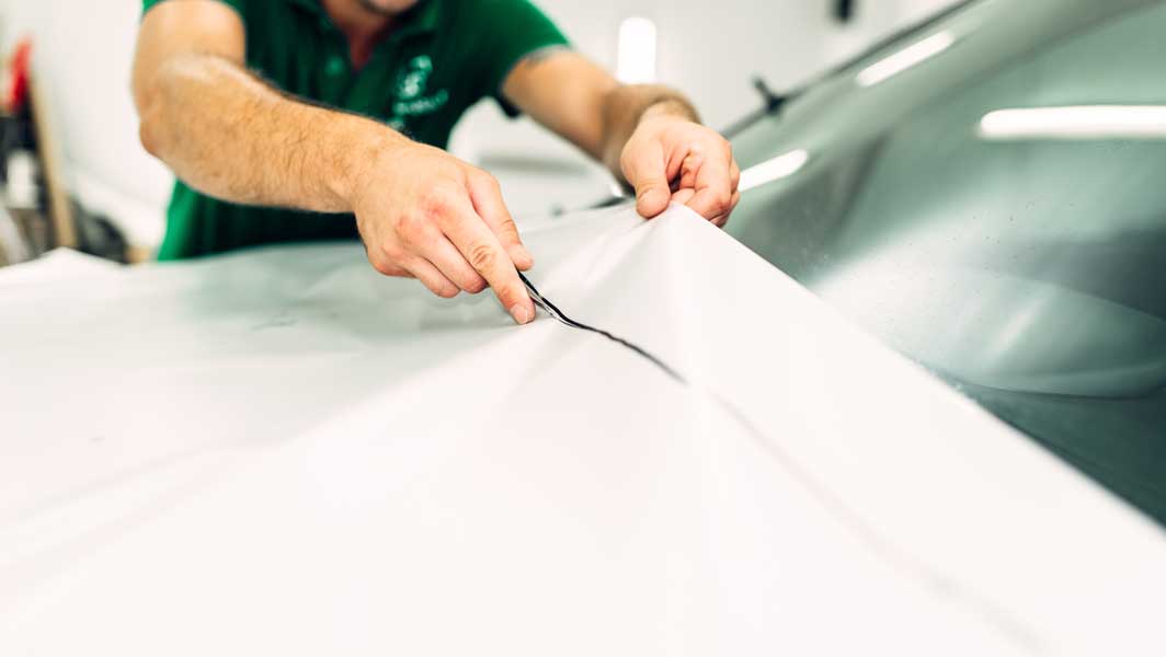 surface protection film on white car hood